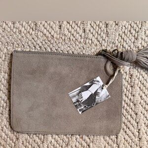 Sea grey suede zippered handbag and fringed keychain!